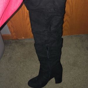 Knee high heeled boots